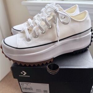Converse Chuck Taylor’s White Platform Sneakers